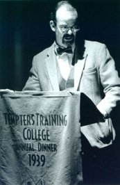 Senior devil Screwtape (Roger Sutton) outlines his vision for corrupting humans at the Tempters Training College Annual Dinner 1939
